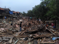 Kampung Pulo Ciliwung riverbank after twelve houses are demolished at the end of the day on 20 August 2015. Bulldozers are expected to come back the next day. Photo: Azas Tigor Nainggolan.