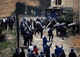 Policiers algériens sous des jets de pierres lors d'une manifestation, Alger, 20 octobre 2009,