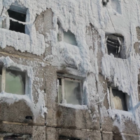 Russian Federation, An Iced and Frozen House in Irkutsk Still Shelters Five Families